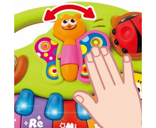 Игрушка пианино «Смайлик» с музыкой и светом от бренда Hola Toys Игрушка пианино «Смайлик» с музыкой и светом от бренда Hola Toys