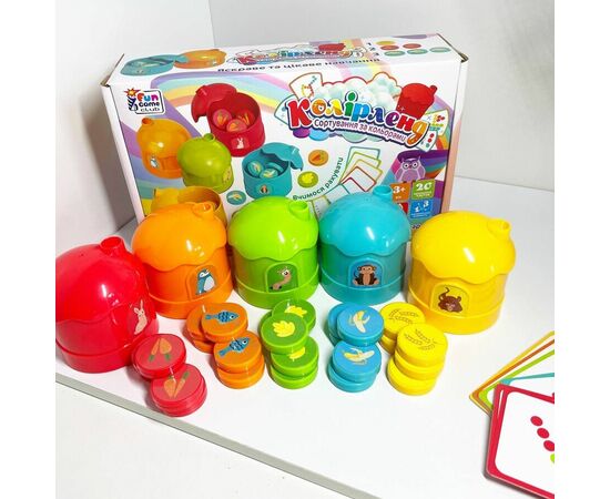 Развивающая игра - сортер "Цветные домики" от бренда Fun Game Club Развивающая игра - сортер "Цветные домики" от бренда Fun Game Club